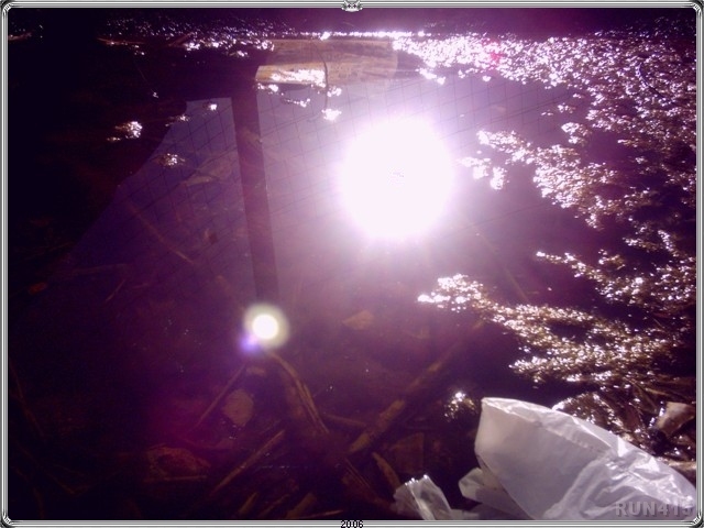 = Human Detritus =
Nice reflection of the sun...
in this scummy pool of filth :)