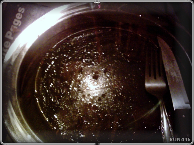 = Oily Plate =
This is my plate after a meal of fish.
It's vegetable oil in strange light.
The pic doesn't do it justice...
it looked amazing in real life.
Darn cheap cameras! :)